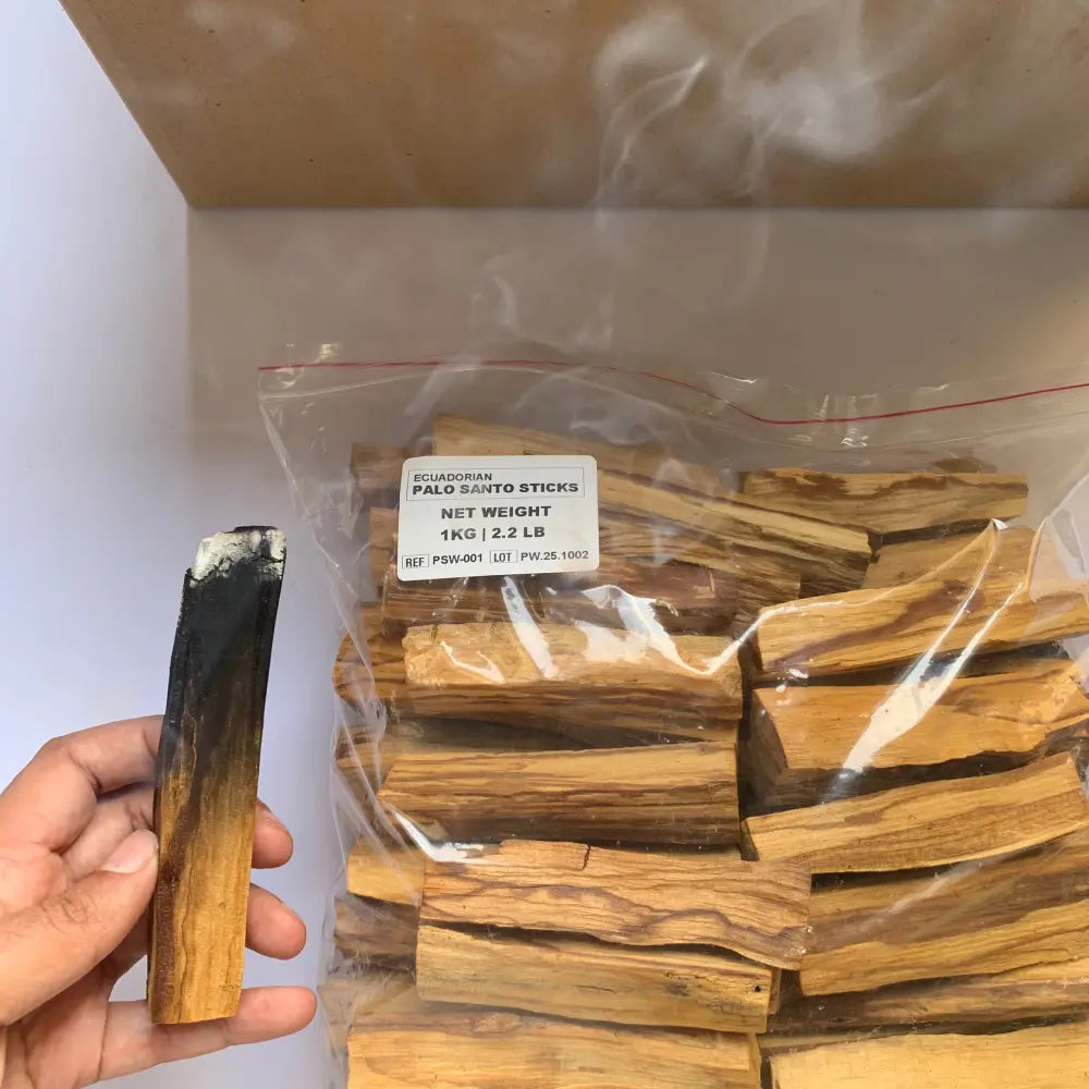 Close-up of Palo Santo powder in transparent bulk bag, labeled and ready for international wholesale export.